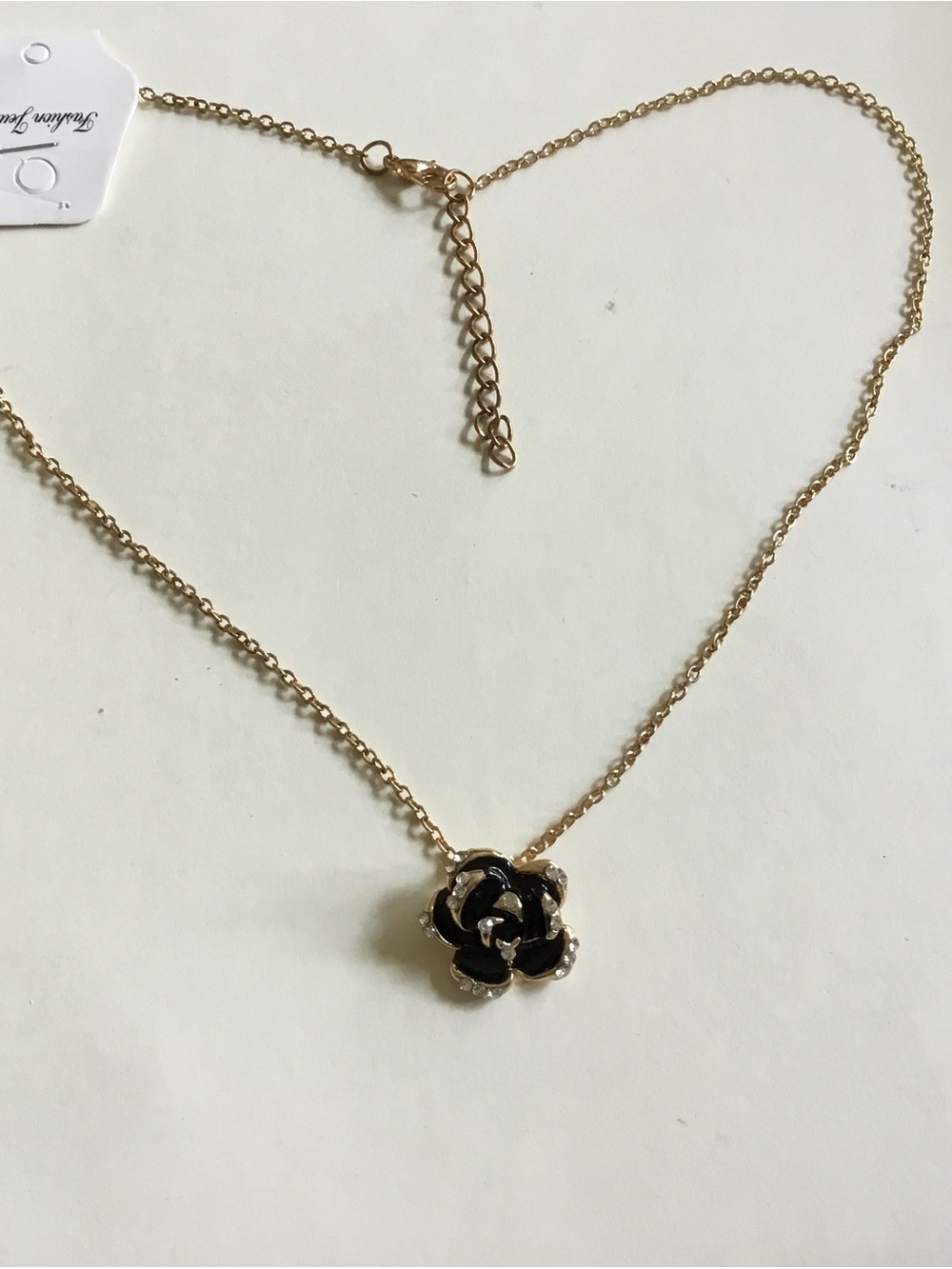 Gold-Tone Necklace with Black Flower Pendant